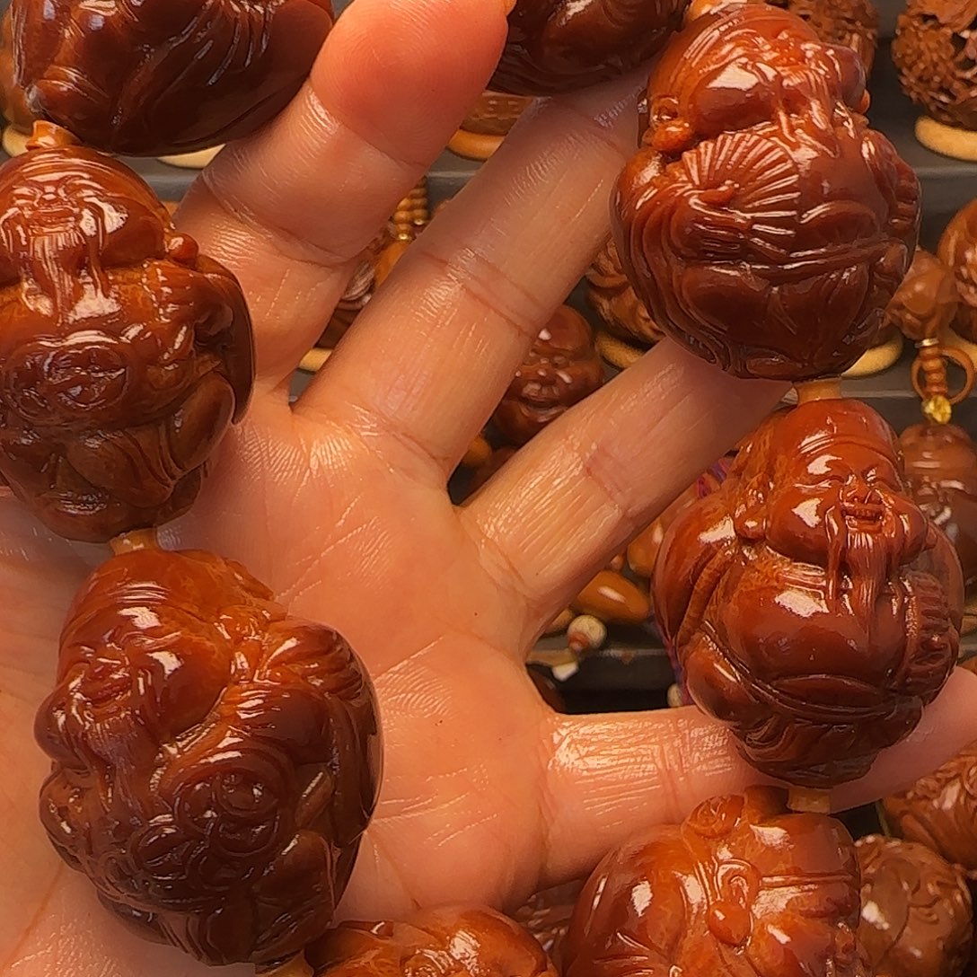 榆***诚橄榄核手串/手链财神玉华3.3左右
