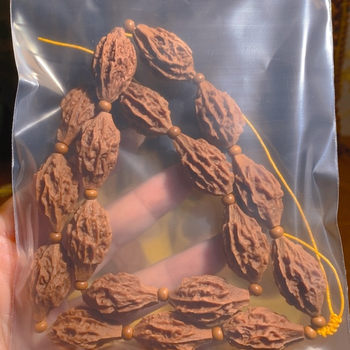 核***8野生麒麟眼橄榄核手持