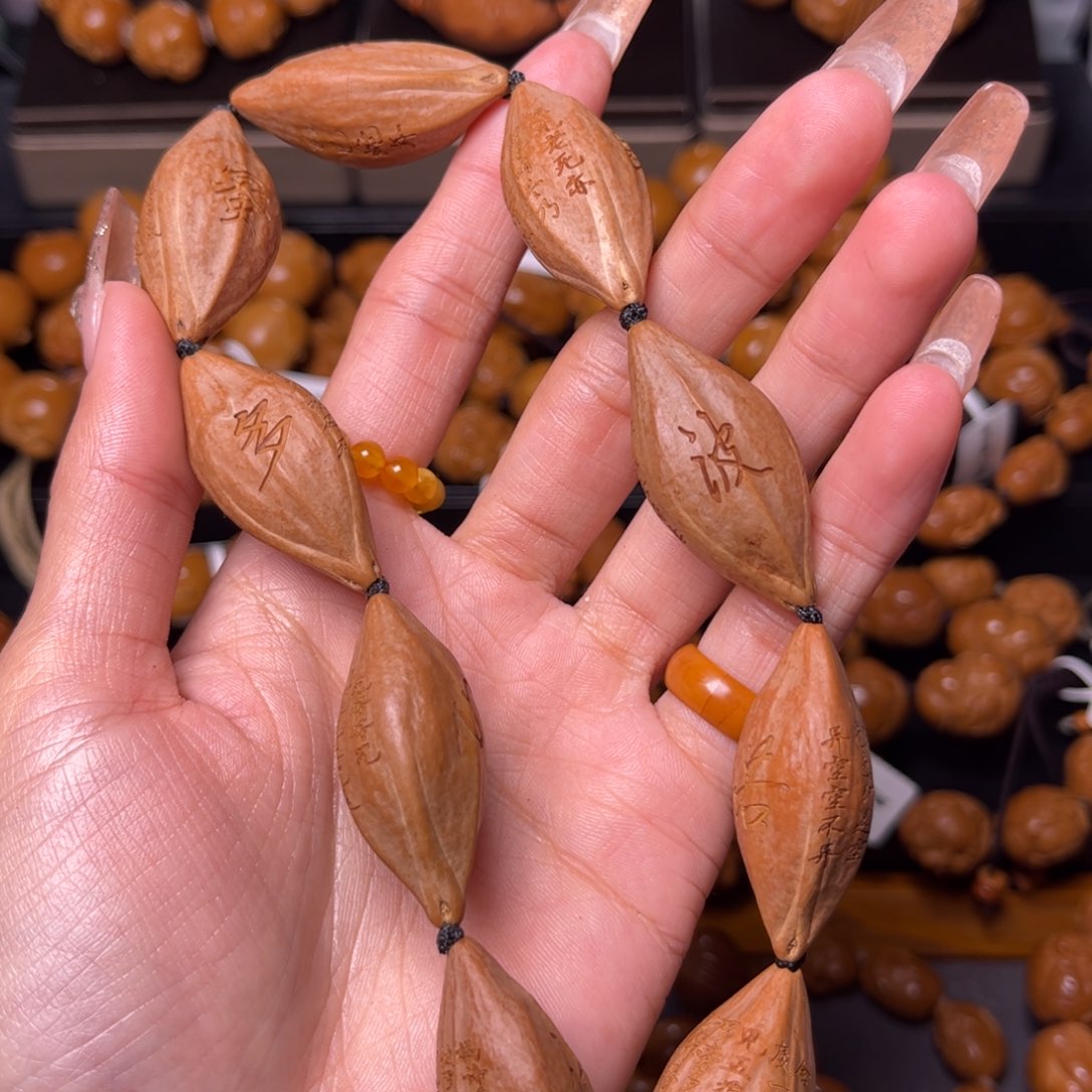 橄榄核吊坠西****?橄榄核手串