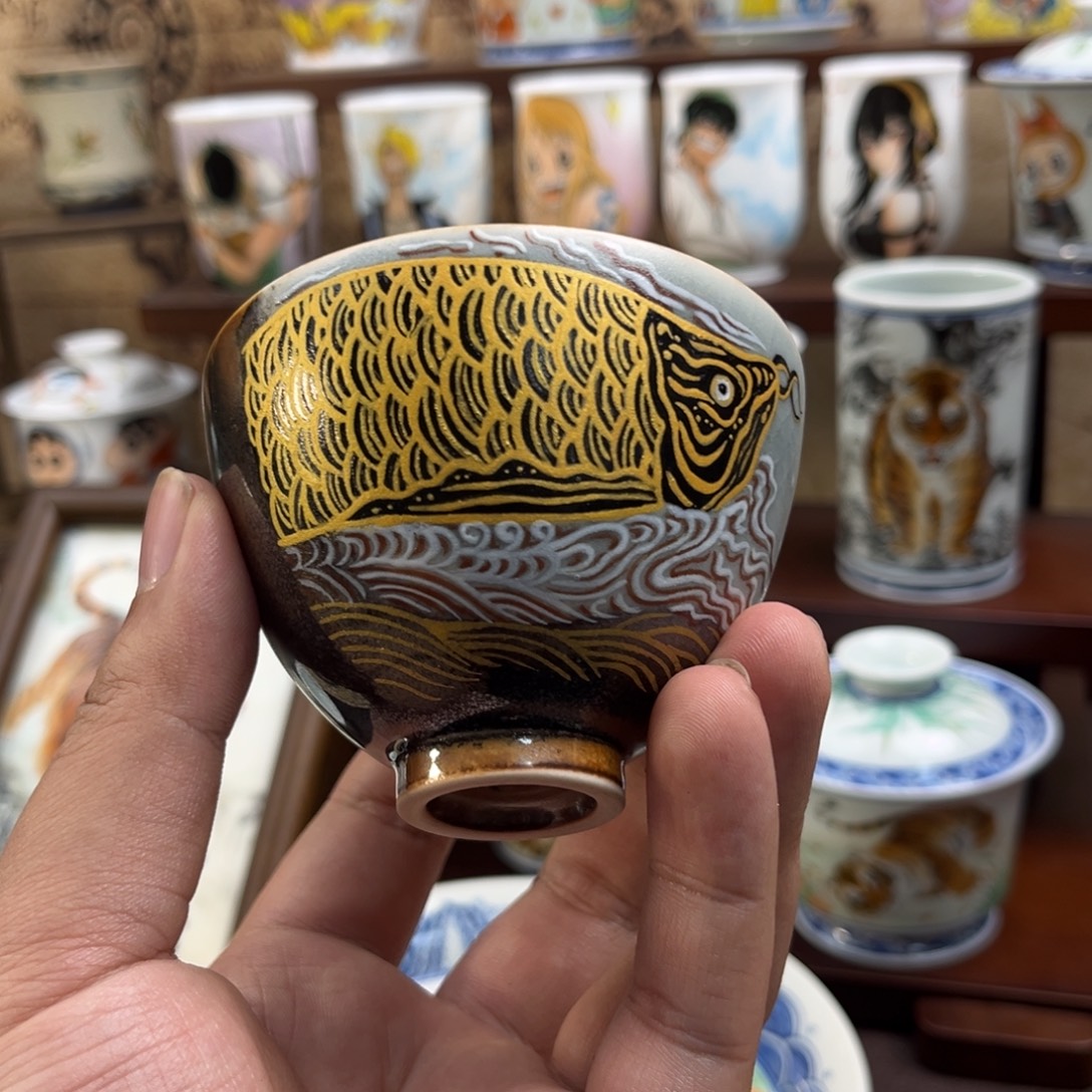竞拍金龙鱼鸡心杯子