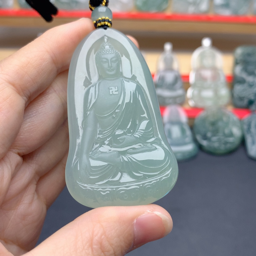 一***头翡翠未镶嵌颈饰阿弥陀佛