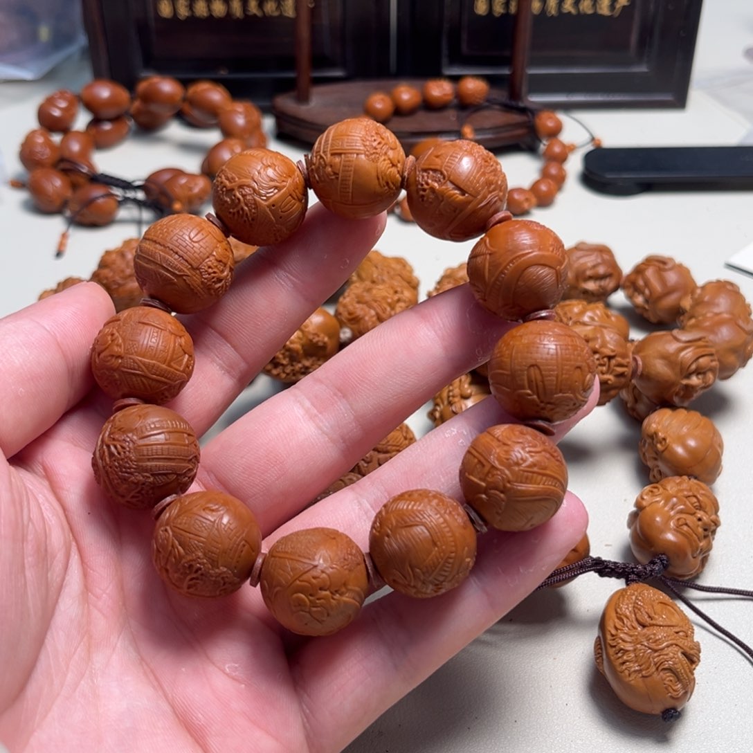 橄榄核吊坠e**貂景秀山河