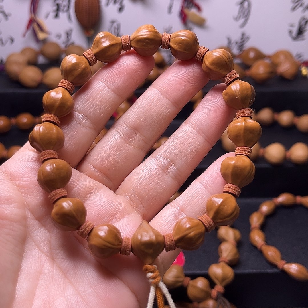 孙***面吊坠橄榄核梅林蜜桃臀12,12