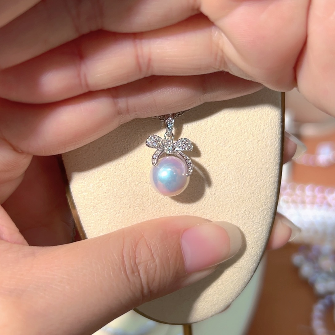 一***头通体银镜面极光背面有生长纹淡水珍珠银S925镶嵌