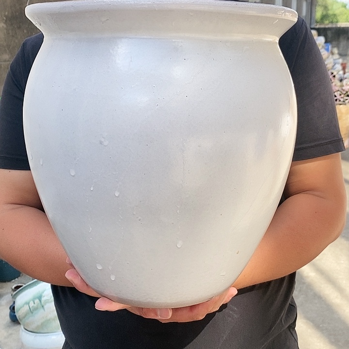 红泥花盆口25高28瑕疵