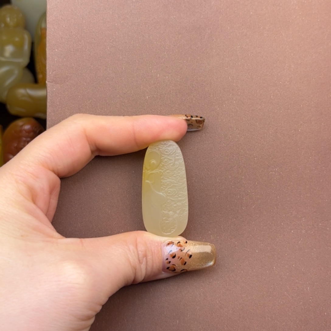 姜***叔石英质玉未镶嵌黄蜡石吊坠