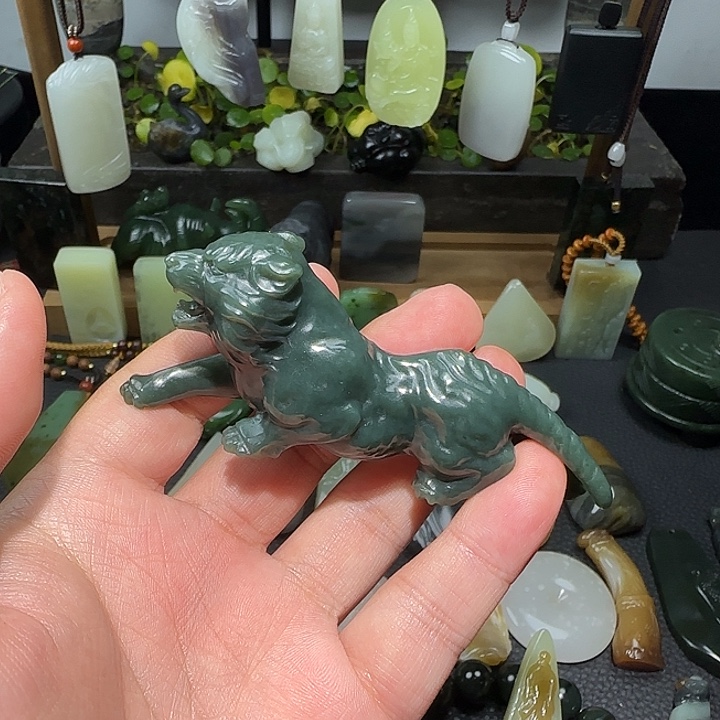 古***仔和田玉未镶嵌把件