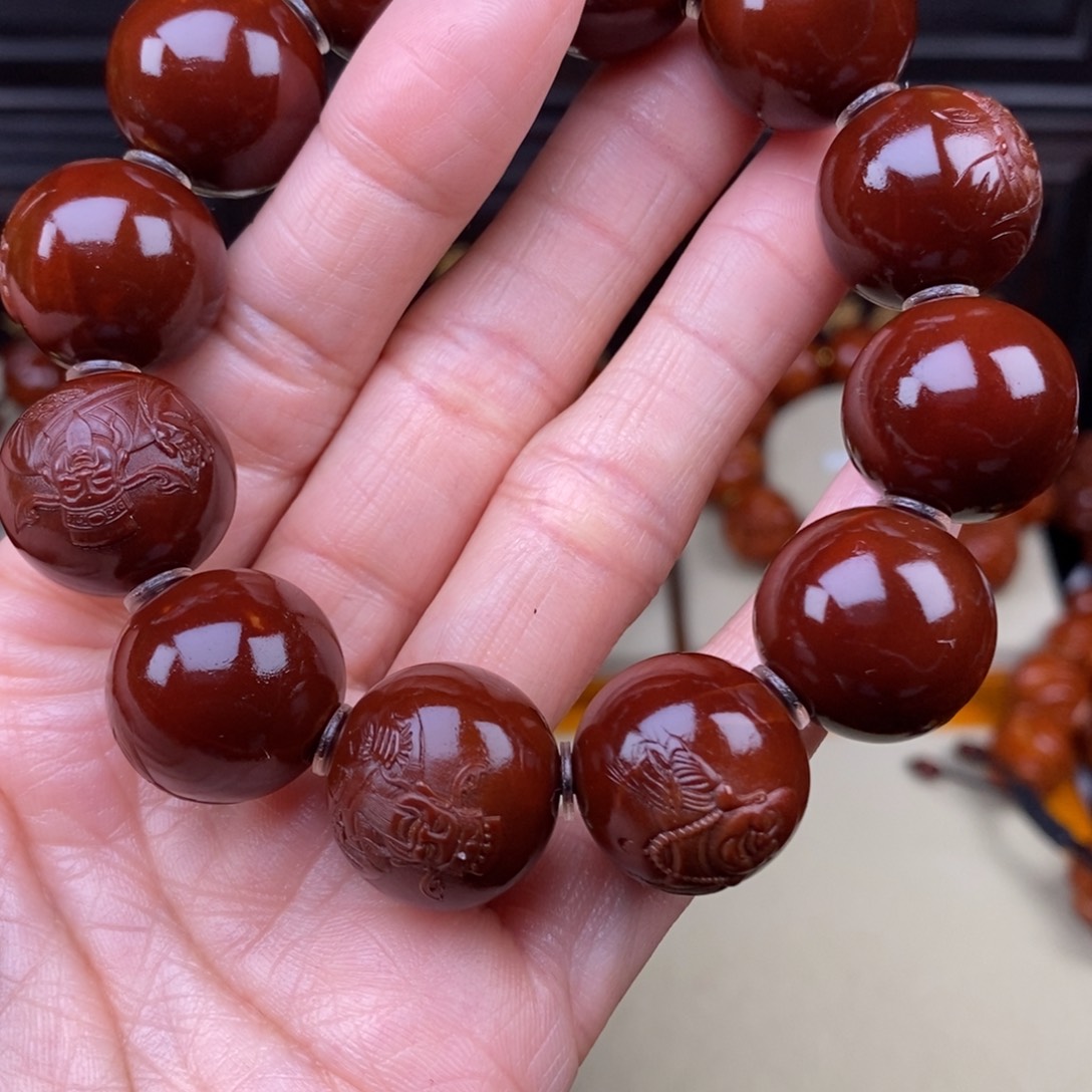 C***具橄榄核吊坠财迷财迷