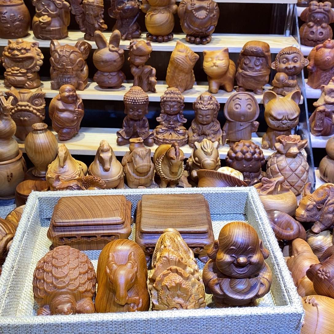 l****木崖柏木雕手把件