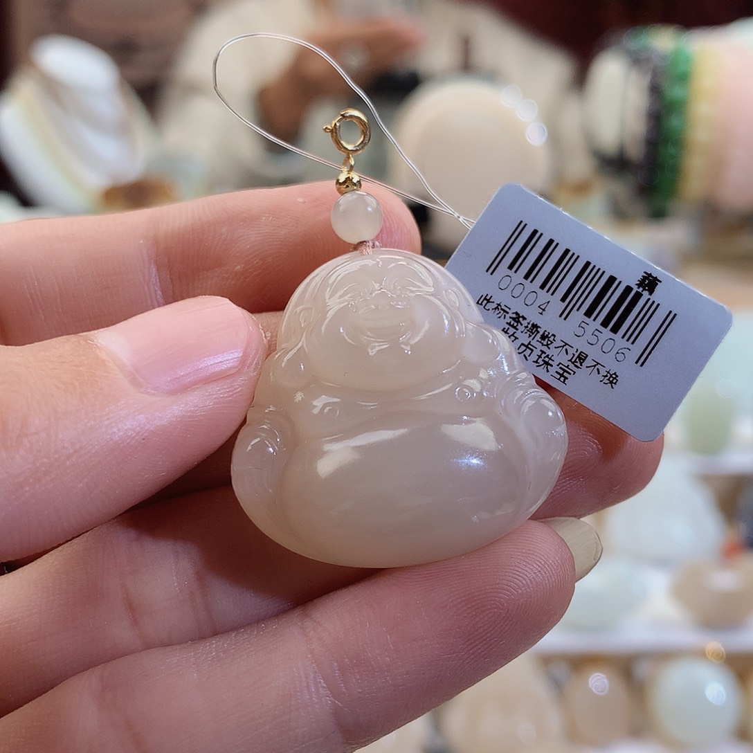 和田玉颈饰未镶嵌卷***面