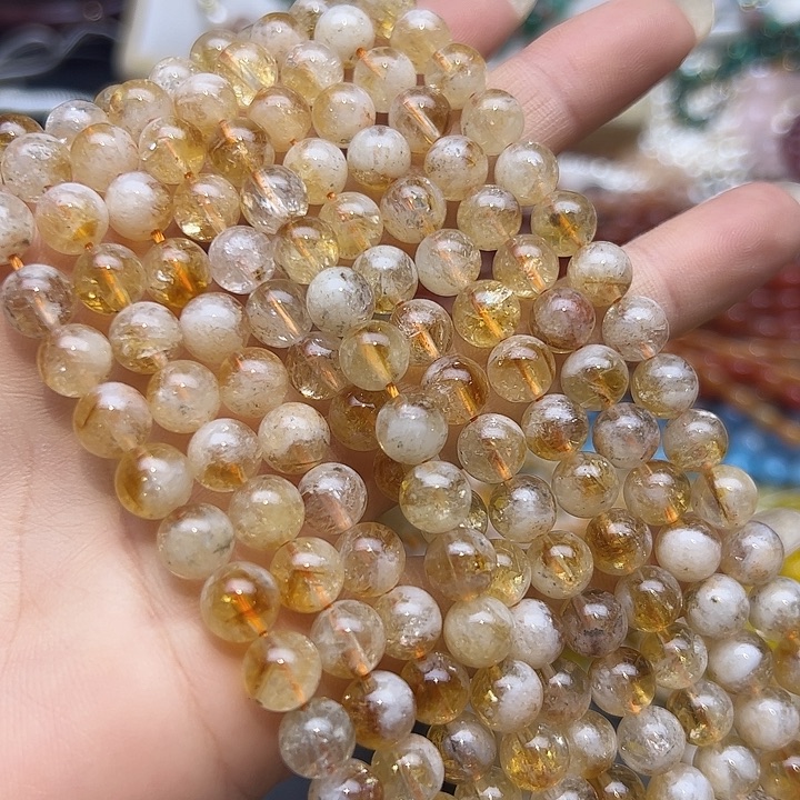 玛瑙/玉髓未镶嵌珠宝半成品T663  8m天然黄塔晶圆珠一条