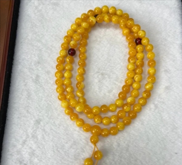 s101新蜜鸡油黄飘白花多圈手串大小可选