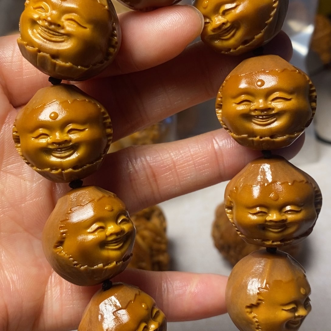 橄榄核手串/手链农**炮包衣十分开心