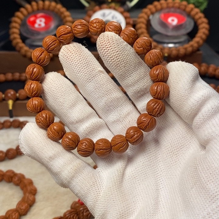 桃核吊坠自*、秦岭龙纹