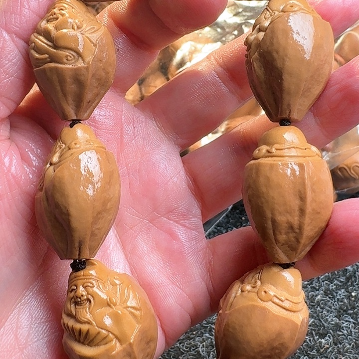 橄榄核吊坠橄榄包衣财神