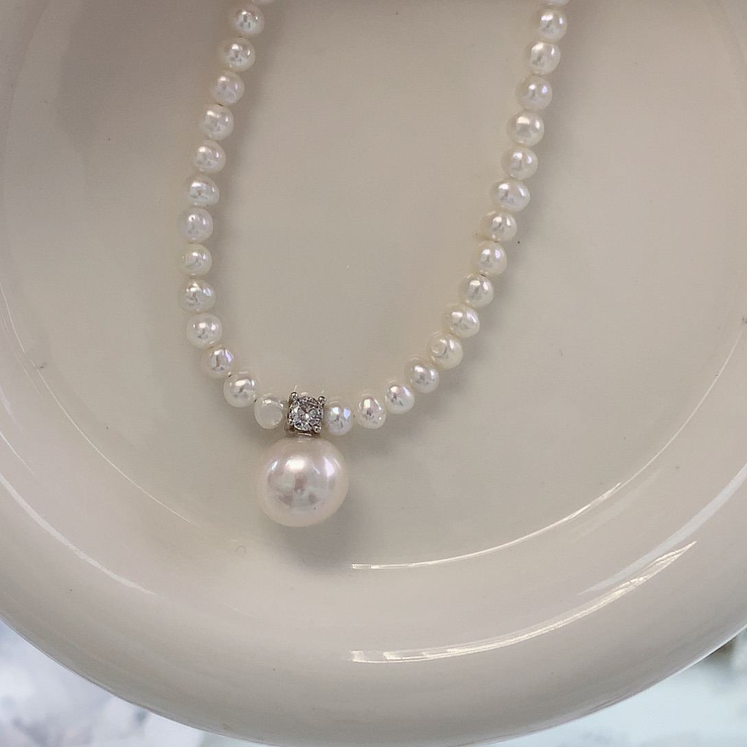 银S925镶嵌耳饰淡水珍珠王妃