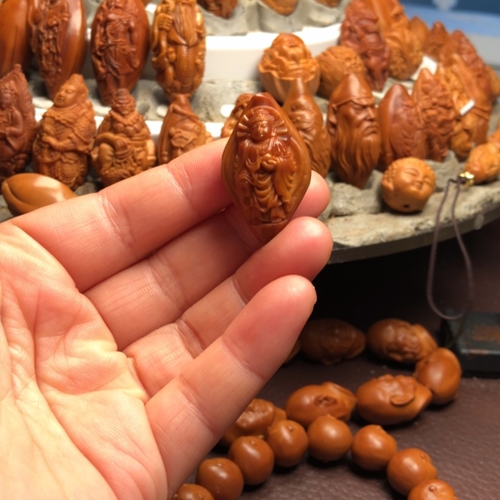 打***邪吊坠橄榄核橄榄核雕刻的单子