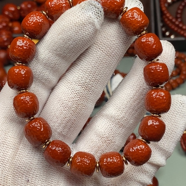 齐***圣橄榄核吊坠8437987678889