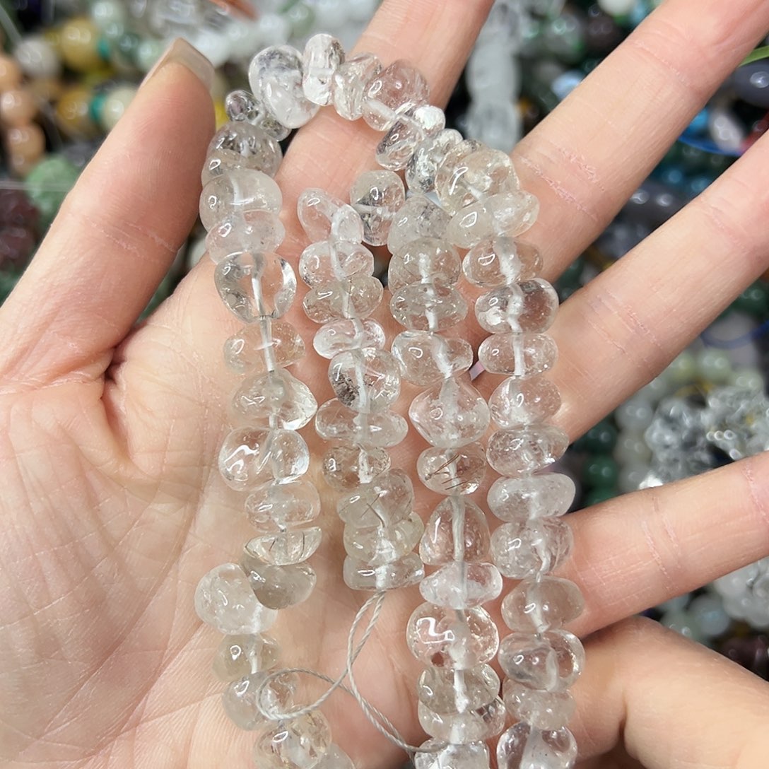 玛瑙/玉髓未镶嵌珠宝半成品，卡11左右浅茶晶随形一条