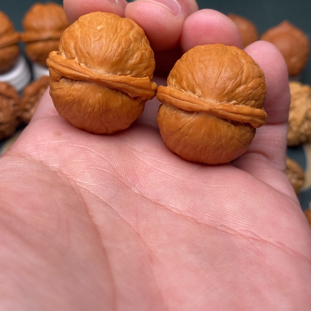 文玩核桃把件金佛