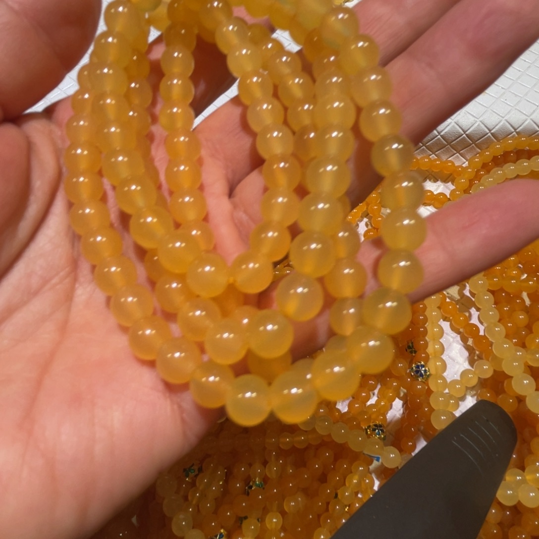 漂***宅石英质玉（黄龙玉）合金颈饰