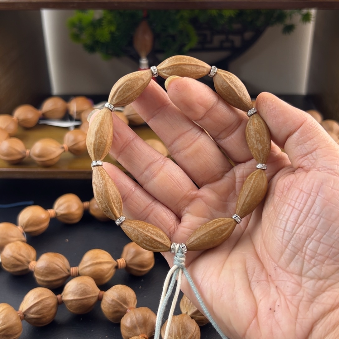 吊坠橄榄核梅林茶心核素串精品小世界