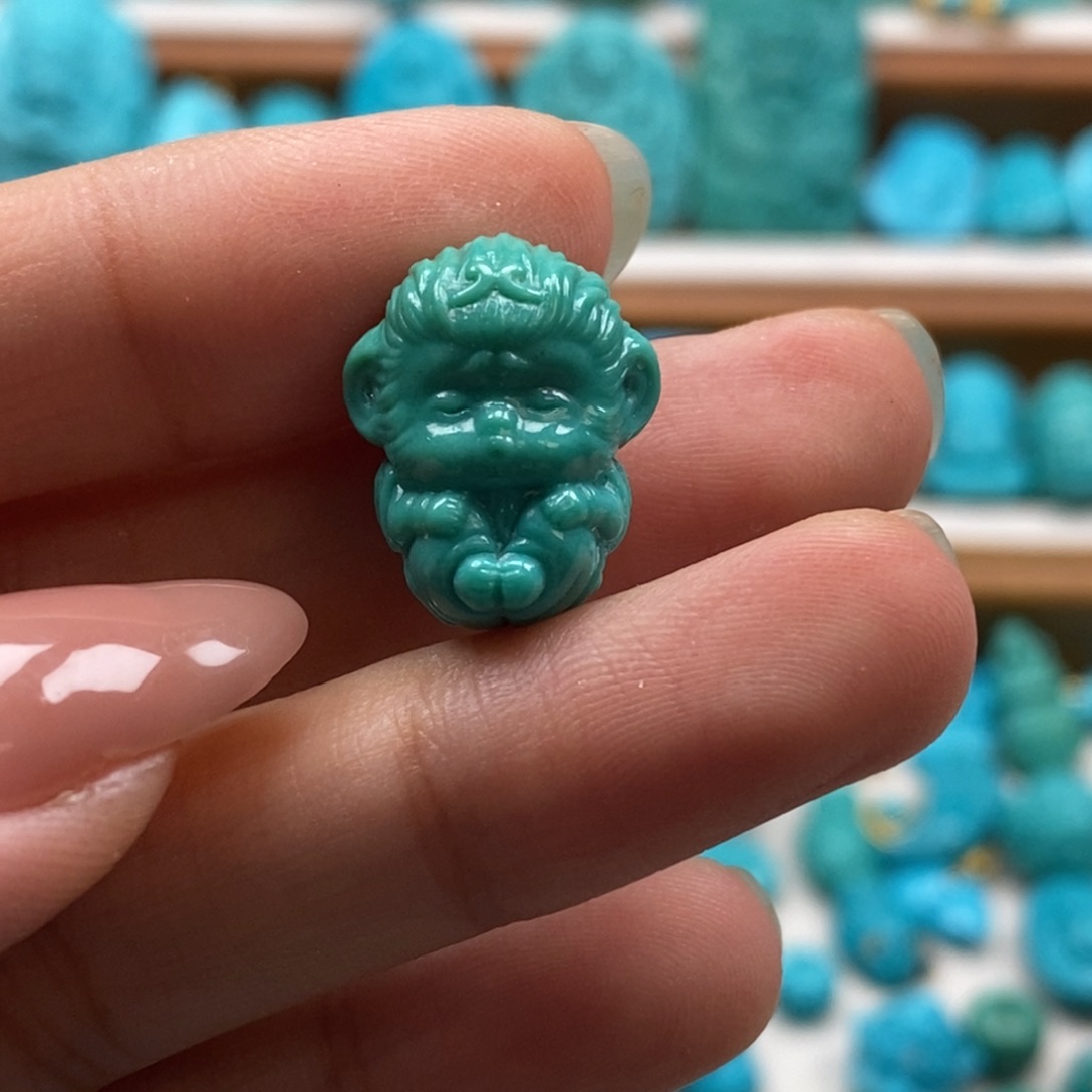 绿松石未镶嵌颈饰蜗*?