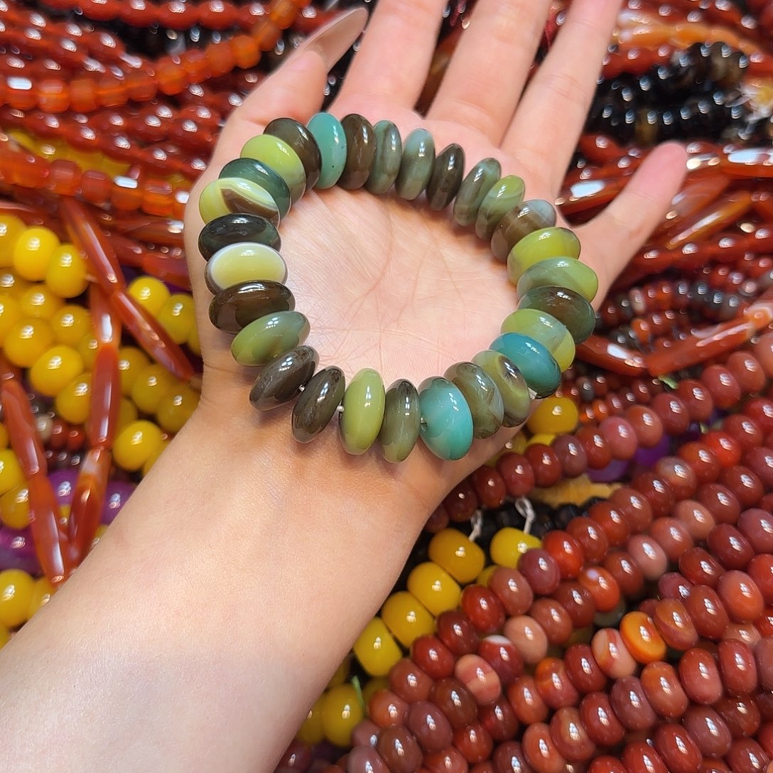 玛瑙/玉髓未镶嵌珠宝半成品16mm黄绿孔雀算盘一串