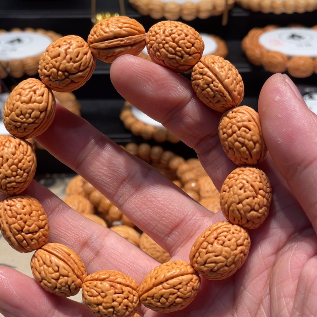 乐***桃核手串钱袋子手串