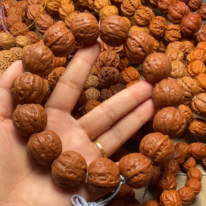 文玩核桃吊坠光头手串