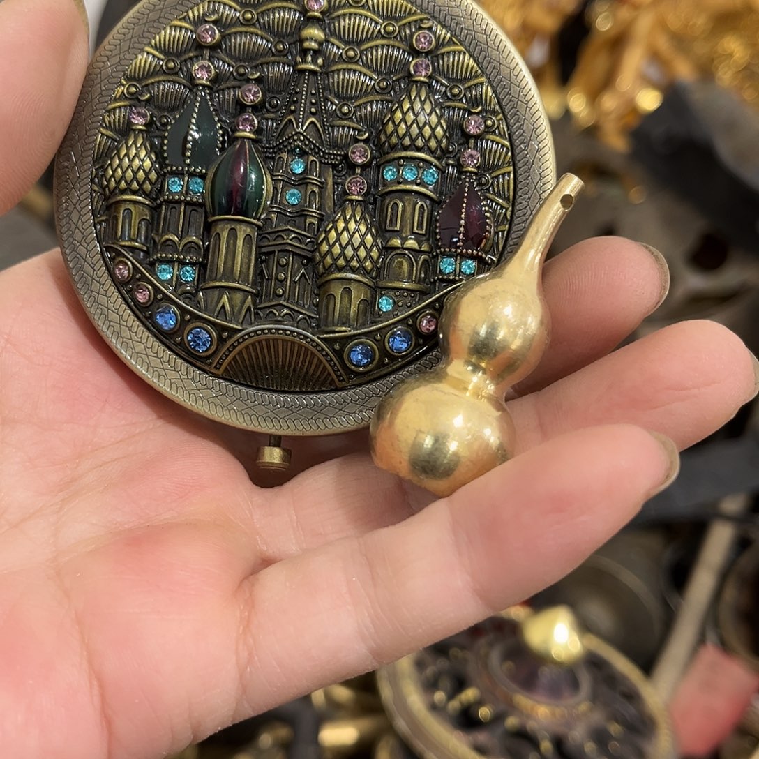 摩***疆闪电购铜摆件工艺品