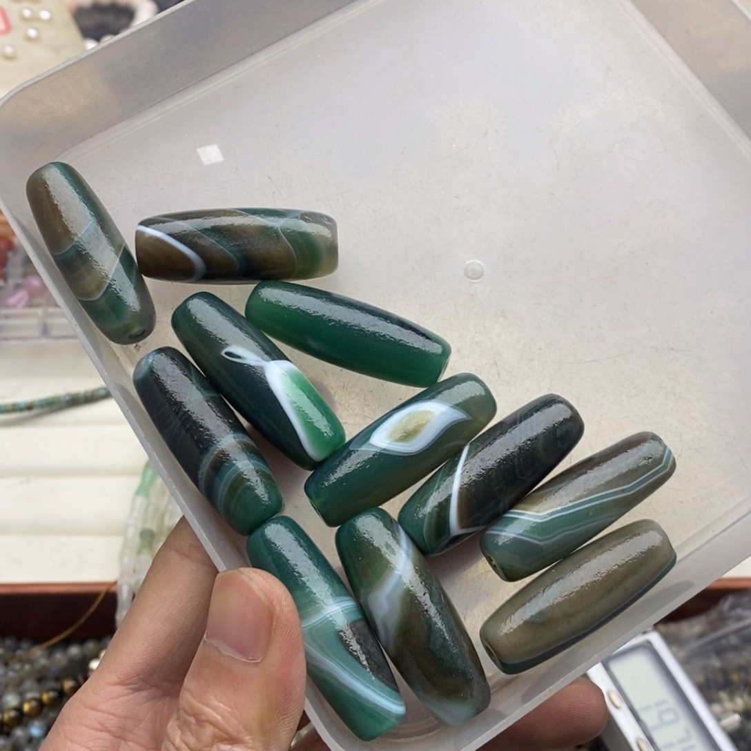 玛瑙/玉髓未镶嵌珠宝半成品一个14×39绿蚕丝玛瑙桶珠