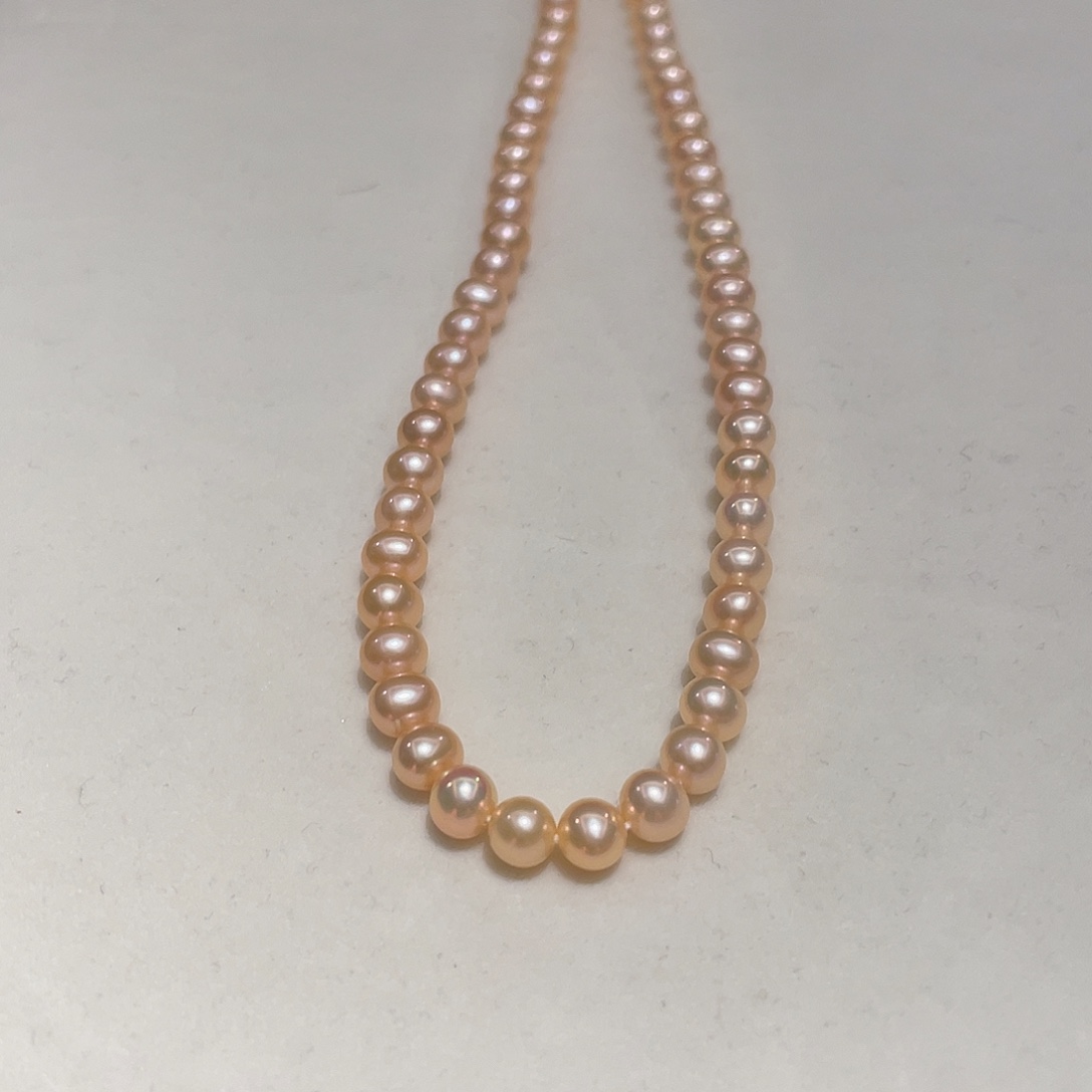 温***瞳颈饰银S925镶嵌淡水珍珠