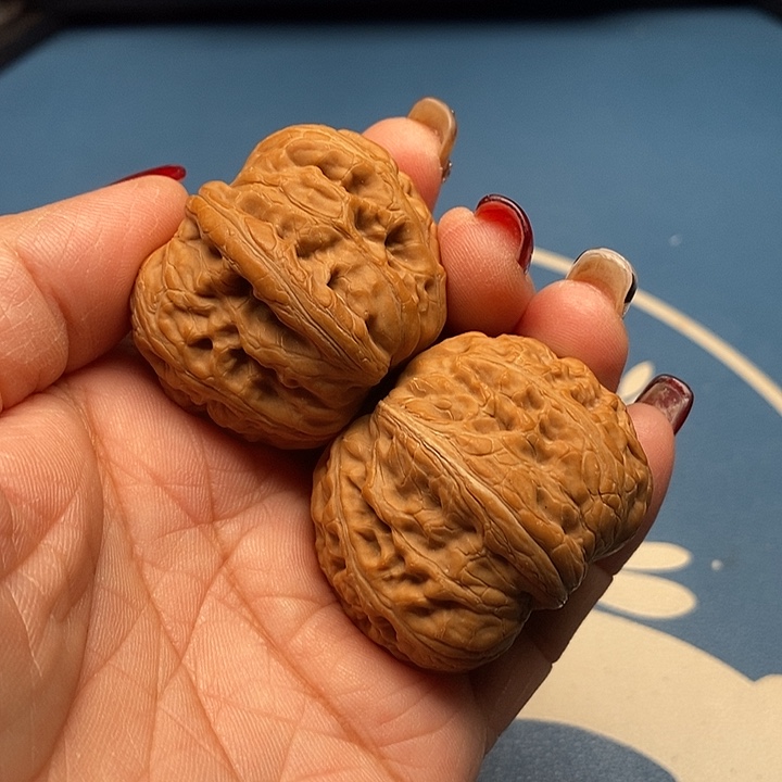 文玩核桃把件我****头元宝