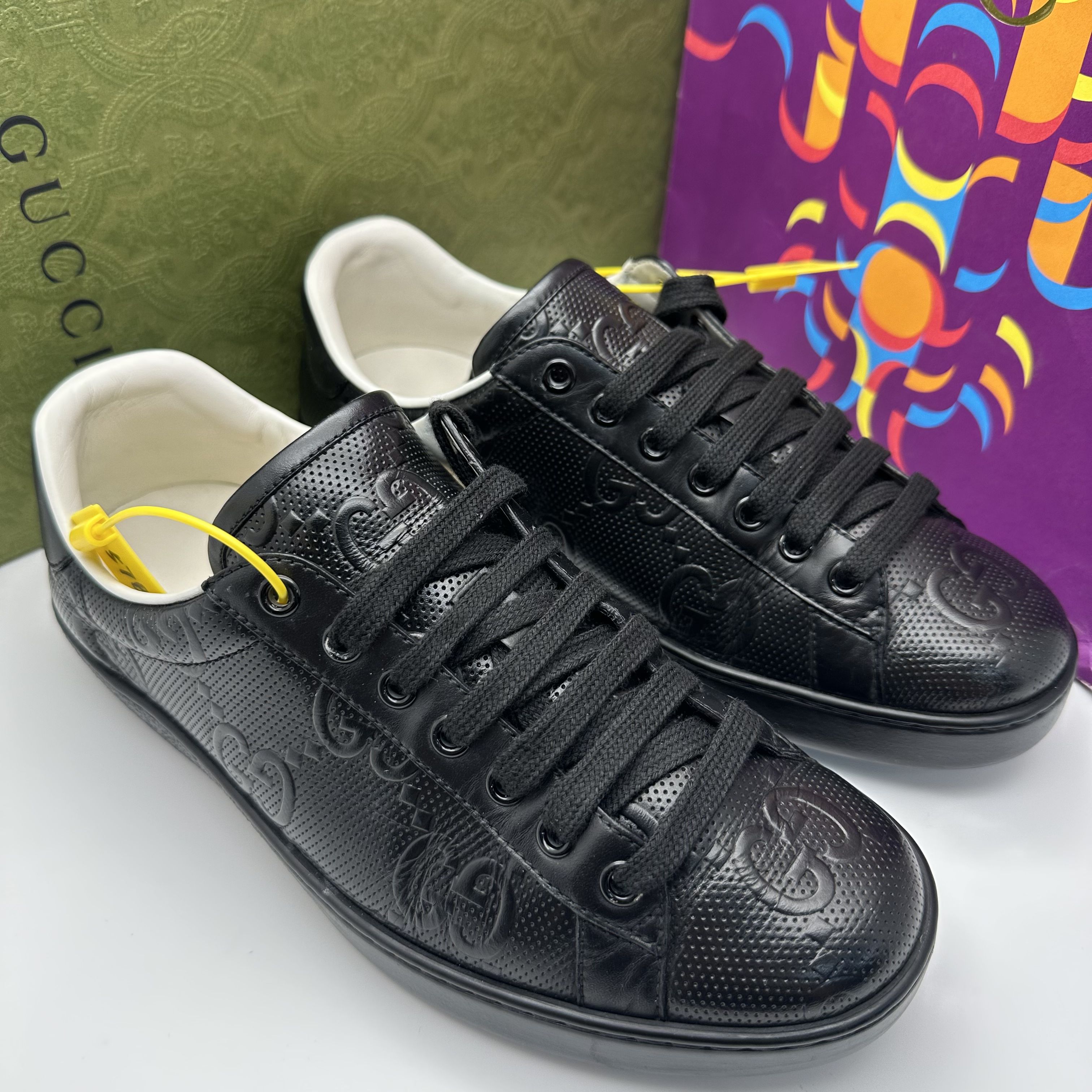 95新 GUCCI/古驰 38.5欧码/黑色皮面双G浮雕休闲时尚板鞋