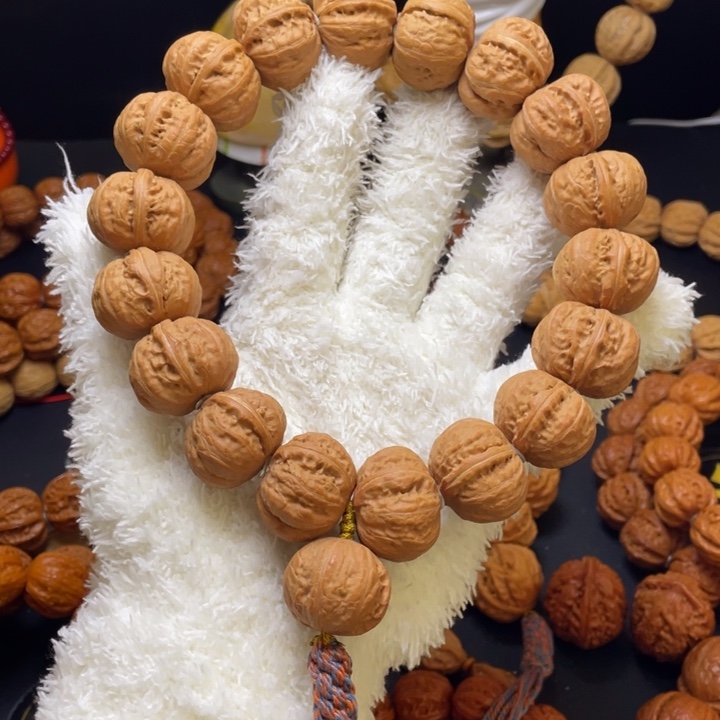 龙***光文玩核桃手串磨盘