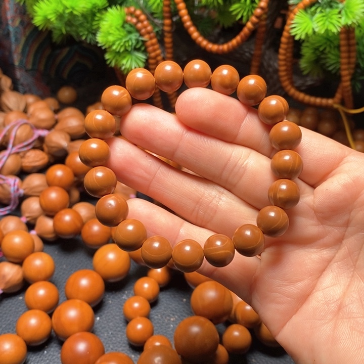 橄榄核手串1.1红料光珠