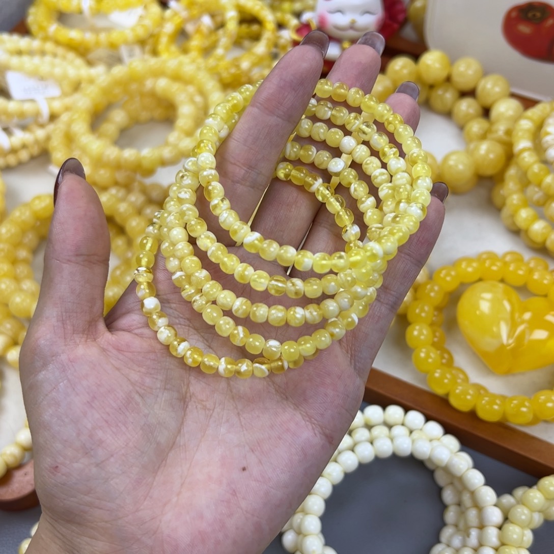 琥珀未镶嵌手链5.5mm 金瓷白多样性发其一
