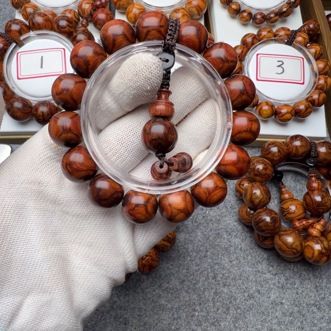 新***梁黄花梨/降香黄檀手串/手链1.5黄花梨紫底对眼鬼脸手串