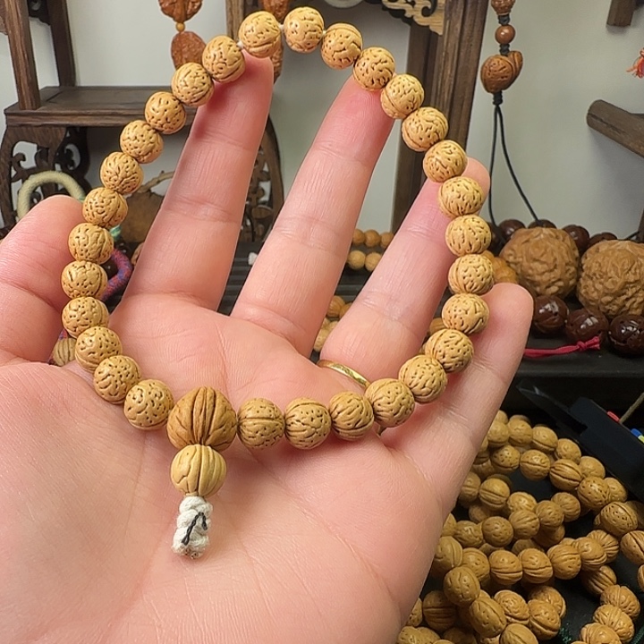王***创吊坠桃核桃核手串