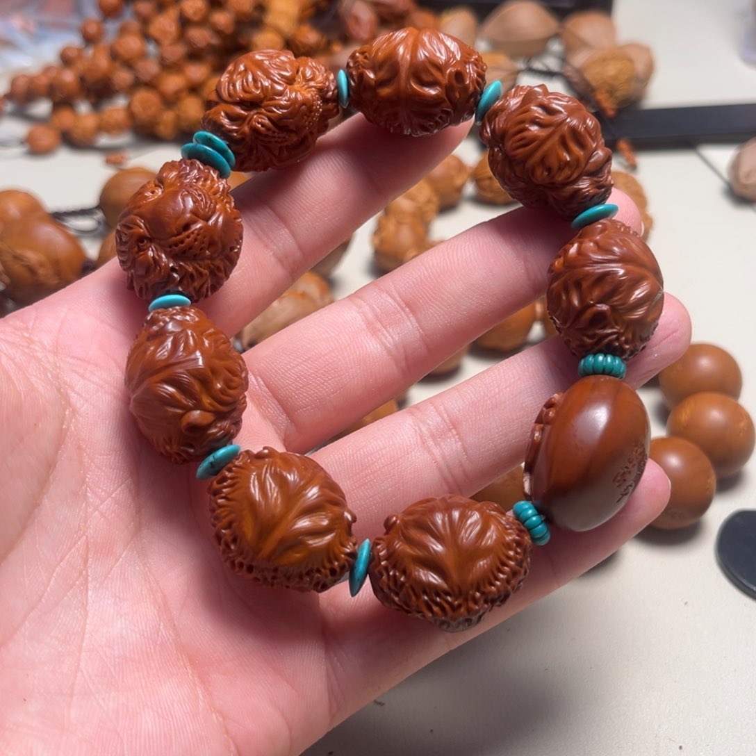 橄榄核吊坠银*回血虎头