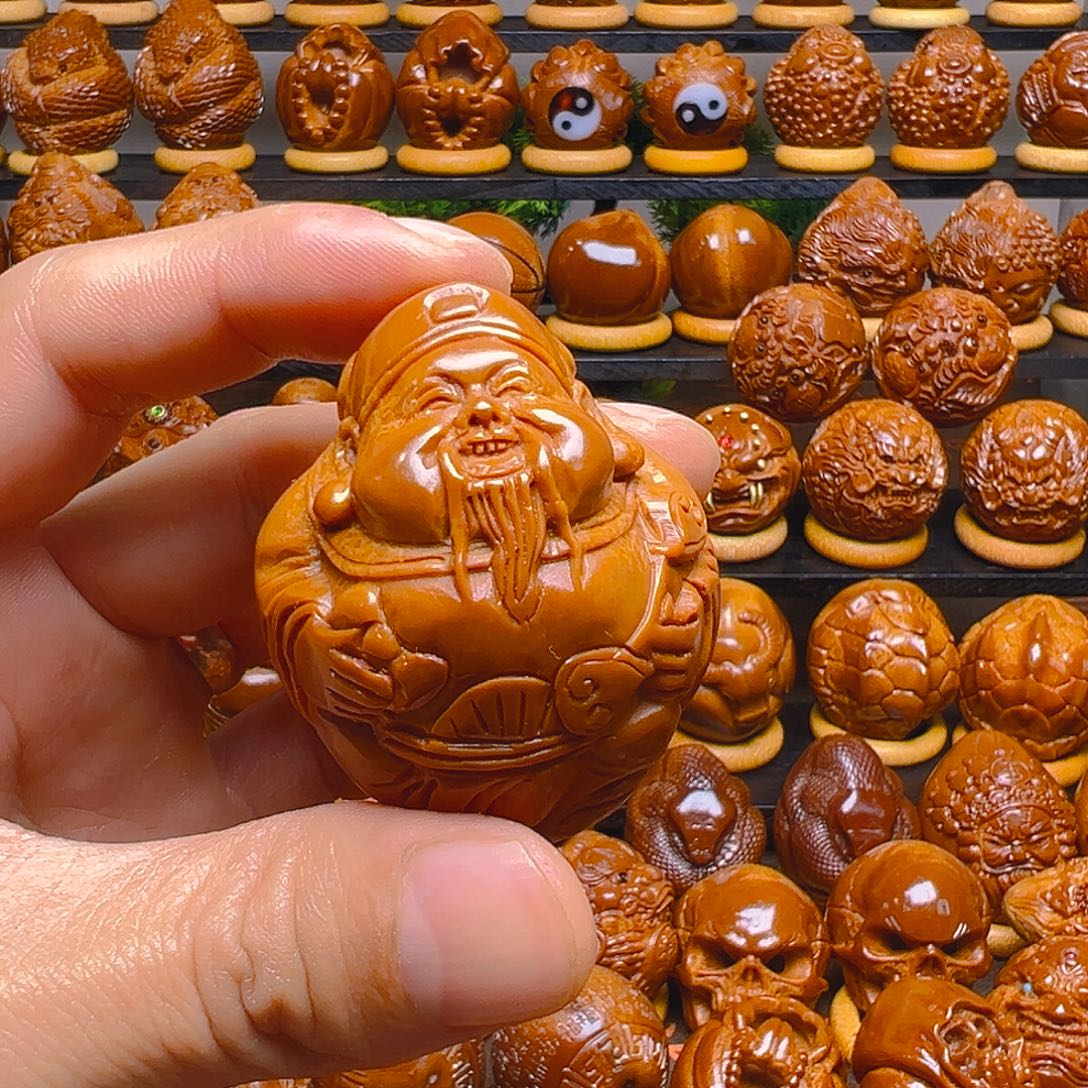 紫***电橄榄核手串/手链4.5官帽财神