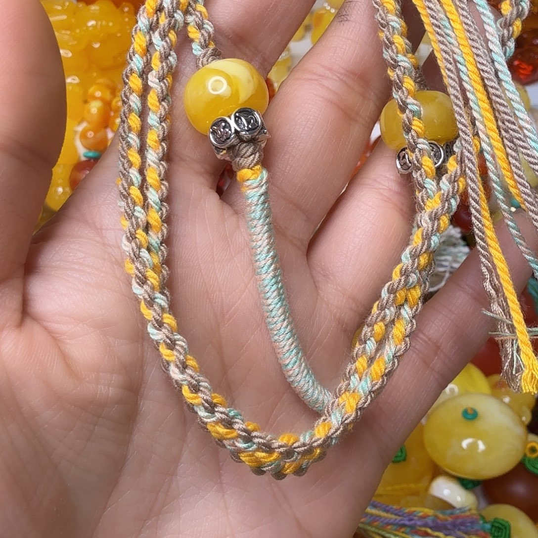 阮****非金属毛衣链绳子编个平结