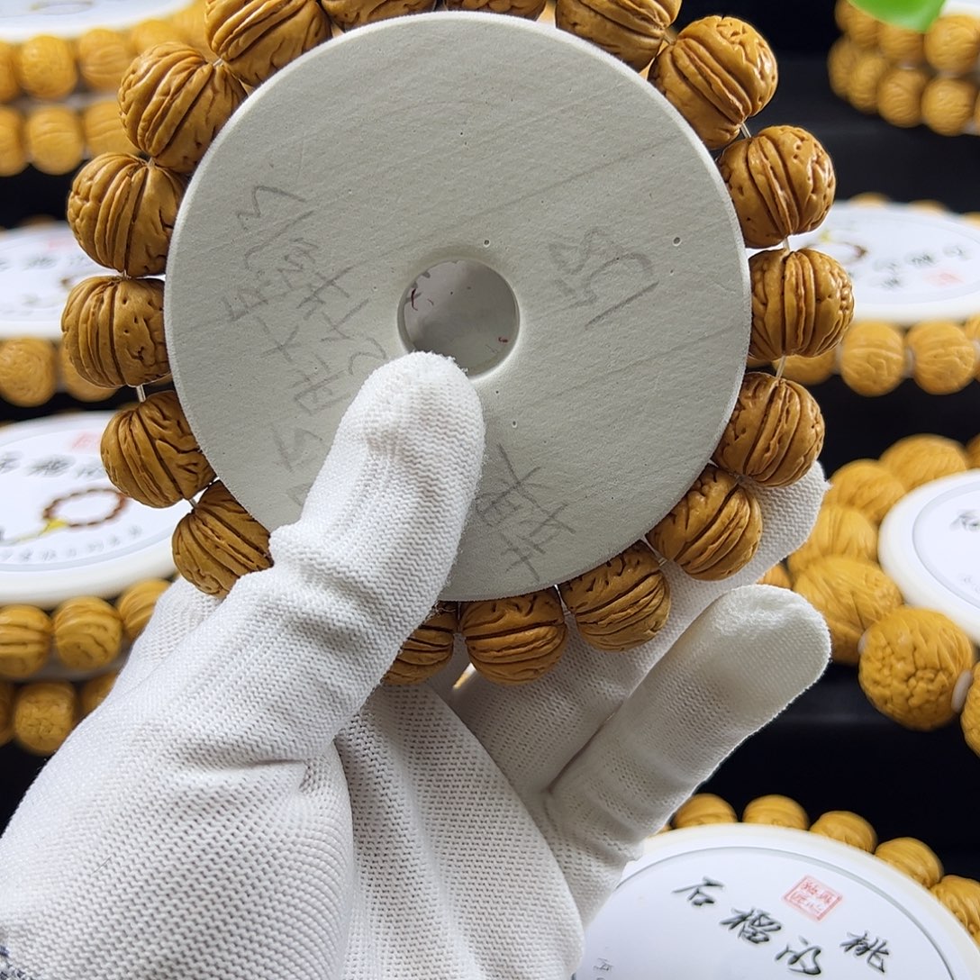 宣***桃核手串苹果园桃核手串。