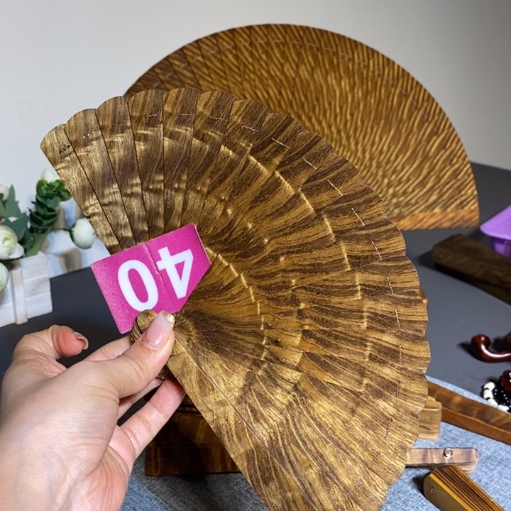 金丝楠流**球金丝楠木扇子