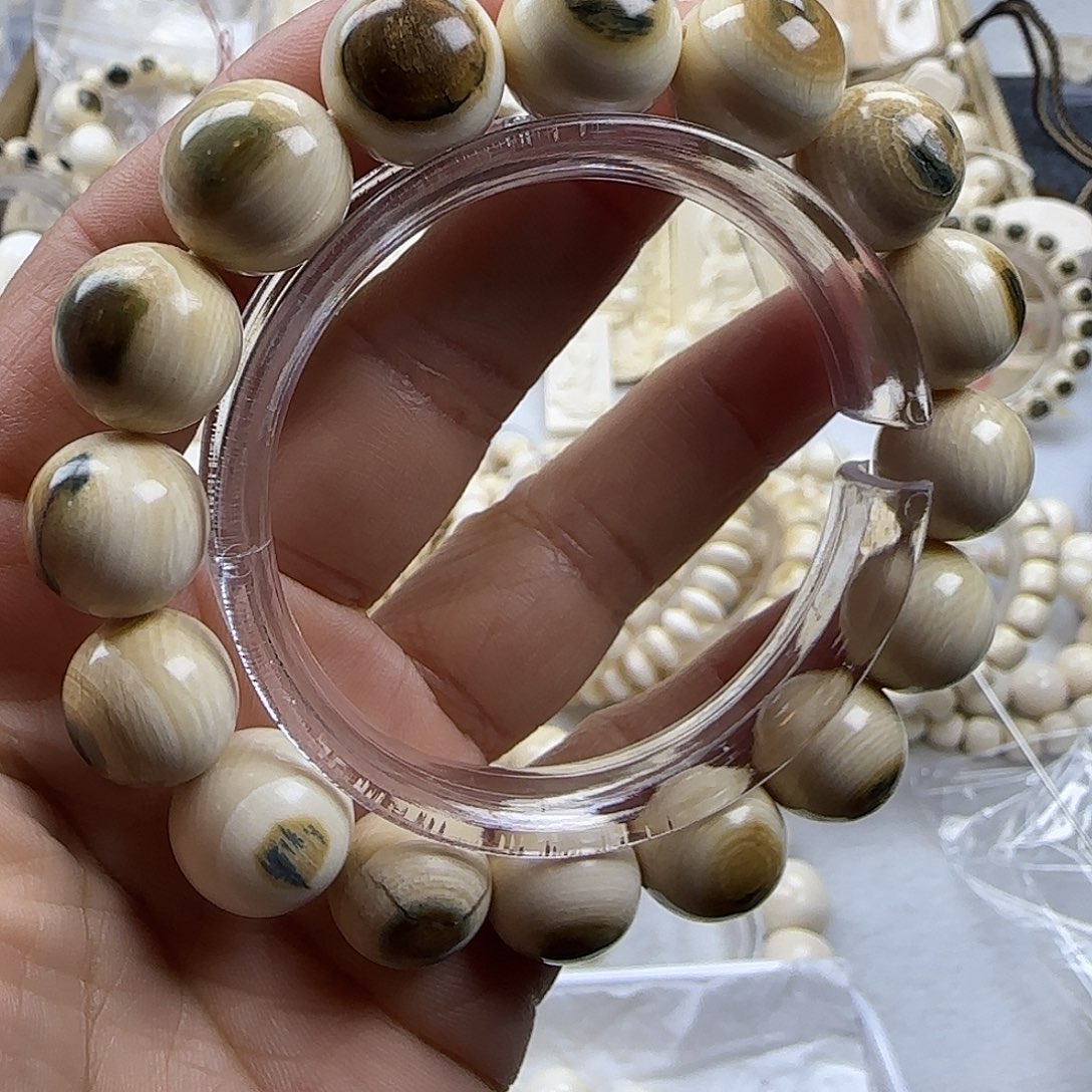 其他猛犸象牙@***海天然保真猛犸牙圆珠带眼，瑕疵珠不退换