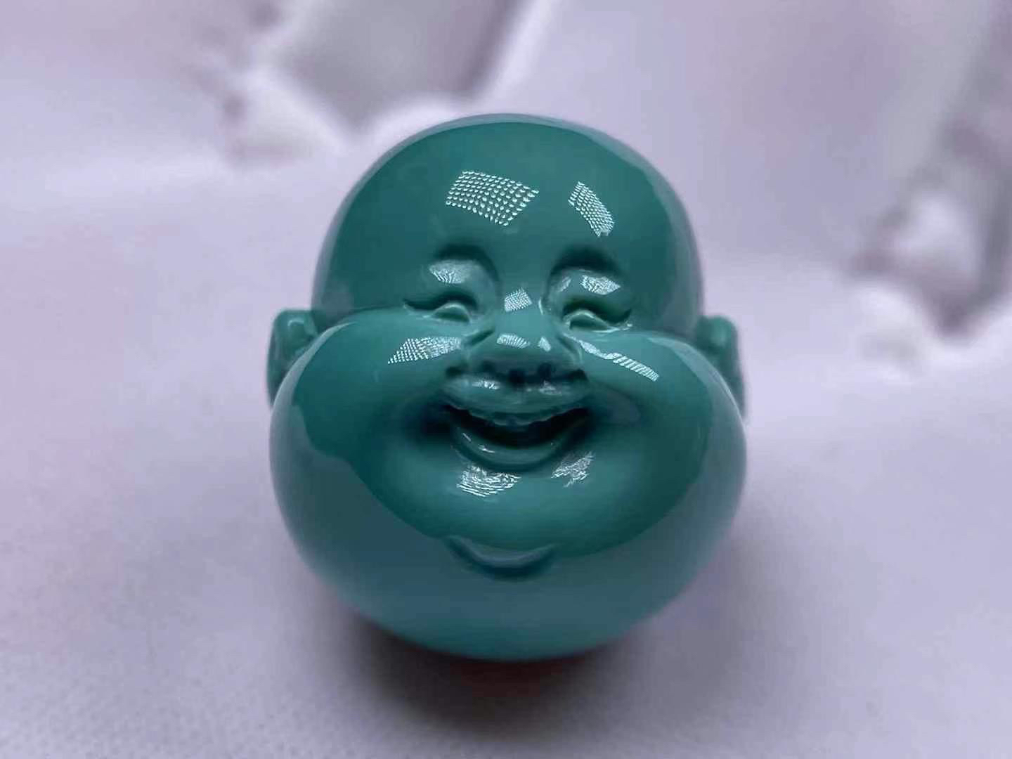 泰鑫绿松石弥勒佛首尺寸11.2mm，重2.8克。