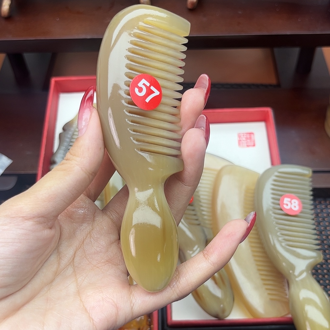 相***8纯手工制作纯牛角梳子