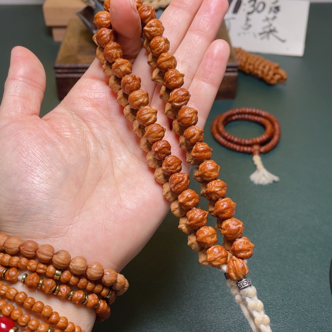 吊坠柏香籽/百香籽白牙横打手持