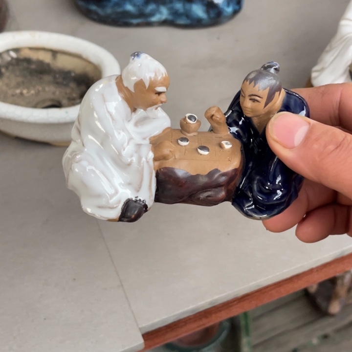 用***7石湾公仔衬托盆景漂亮